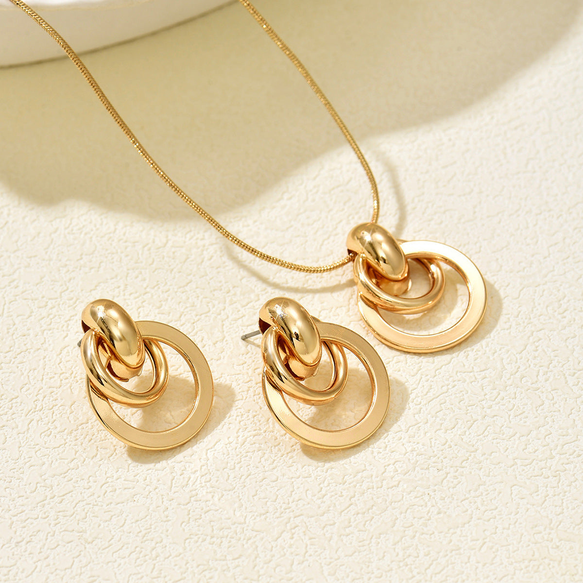 Gold Interlocking Circle Jewelry Set for Women, 14K Gold Plated Double Hoop Drop Earrings and Pendant Necklace, Hypoallergenic Minimalist Statement Jewelry